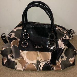 Coach purse with crossbody strap and wrist handle